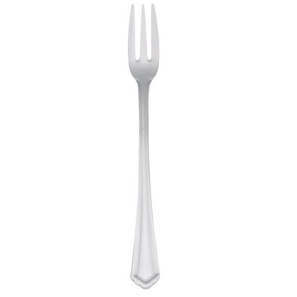 A Libbey stainless steel cocktail fork with a white handle.
