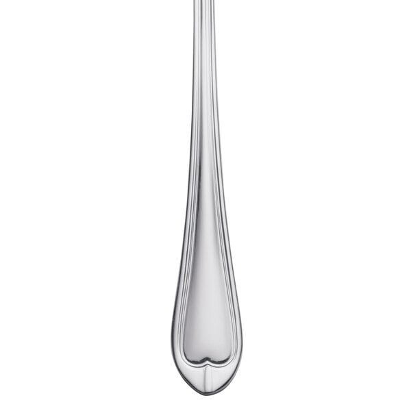 A close-up of a Libbey stainless steel cocktail fork with a long stem and a heart on it.