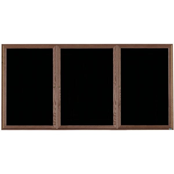 Three black Aarco message boards with a walnut frame.