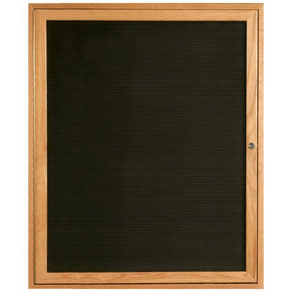 A black felt message board enclosed in a wooden frame.