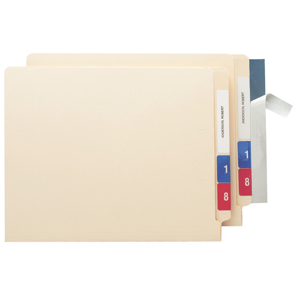 A clear Smead label protector on a file folder with a label.