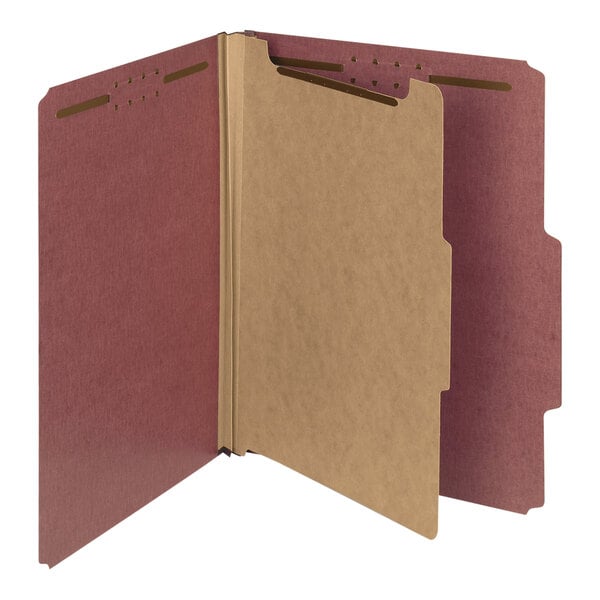 A close-up of a red and tan Smead heavy weight classification folder.