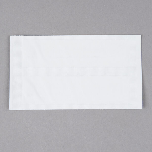 A white envelope with a white rectangular object inside.