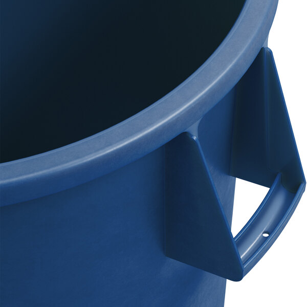 A Carlisle blue plastic round trash can with a handle.