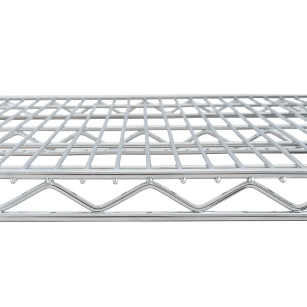 A Metro Super Erecta chrome wire shelf with a grid on top.