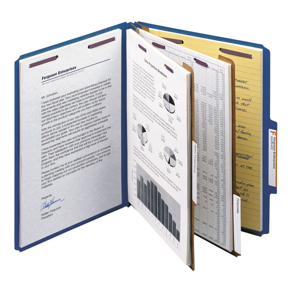 A Smead blue classification folder with papers, graphs, and charts.