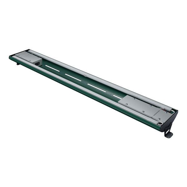 A long green and silver Hatco curved display light on a rail.