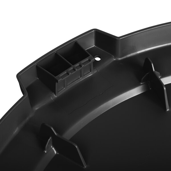 A close-up of a black plastic round lid for a Carlisle Bronco trash can.