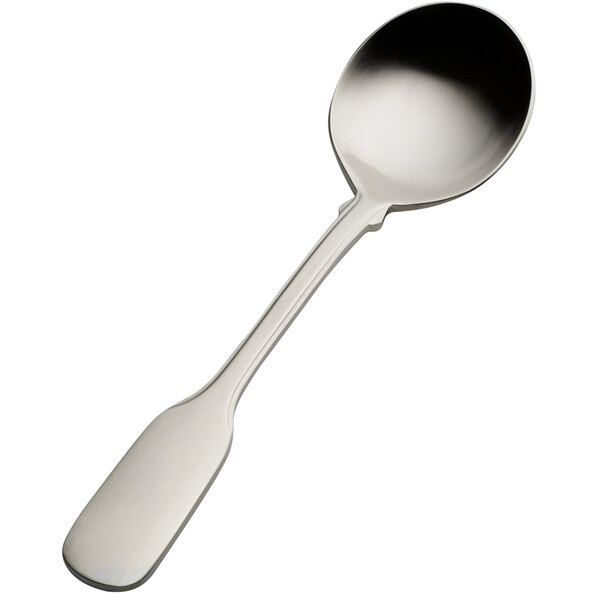 The handle of a Bon Chef Liberty stainless steel bouillon spoon.