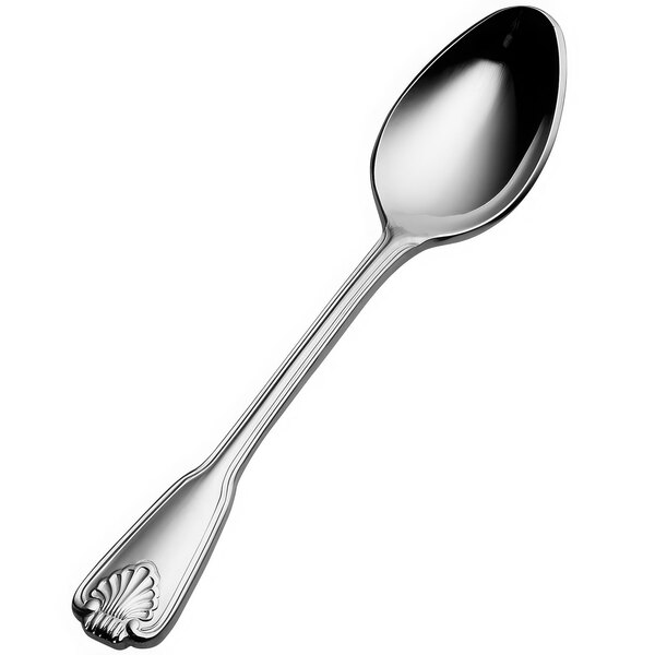 A Bon Chef stainless steel demitasse spoon with a shell design on the handle.