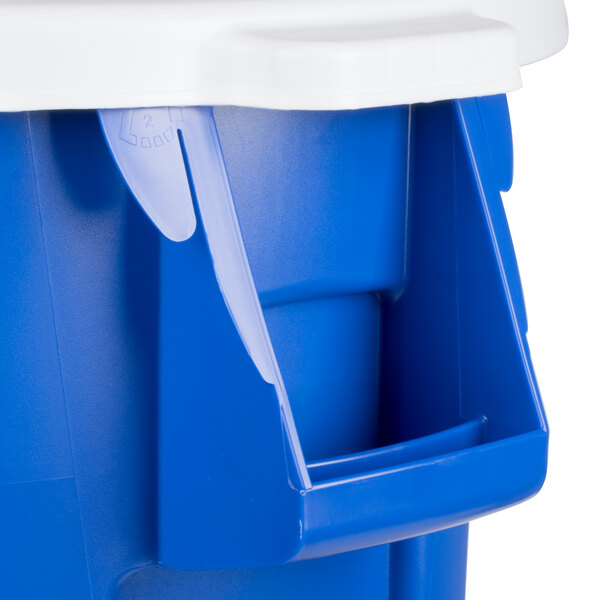 A blue Rubbermaid BRUTE recycling can with a white lid.