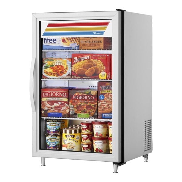 A True white glass door countertop freezer with food inside.