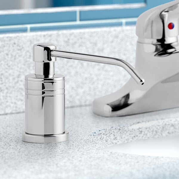 A chrome deck mount foaming soap dispenser with a 6" spout.