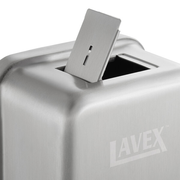 A silver rectangular Lavex stainless steel liquid soap dispenser with a rectangular object inside.