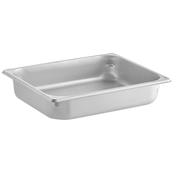 A Hatco stainless steel half size food pan on a counter.