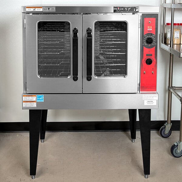 A Vulcan commercial electric convection oven with two doors and a rack.