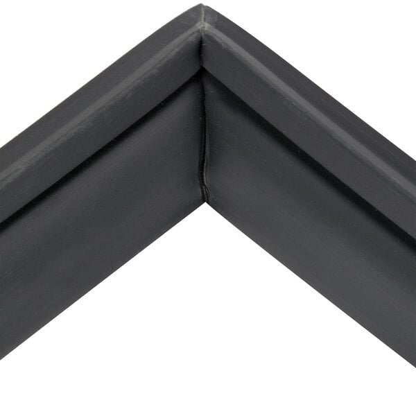 A black corner of a True 810844 drawer gasket.