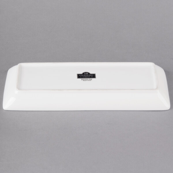 A white rectangular 10 Strawberry Street porcelain coupe platter.