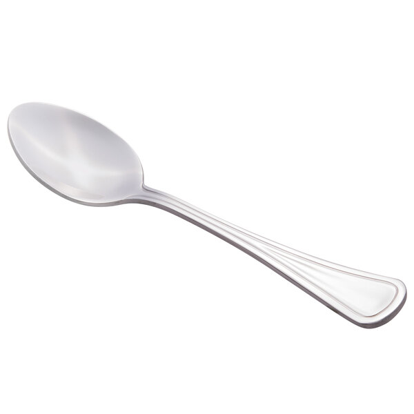 A Libbey stainless steel teaspoon with a silver handle.