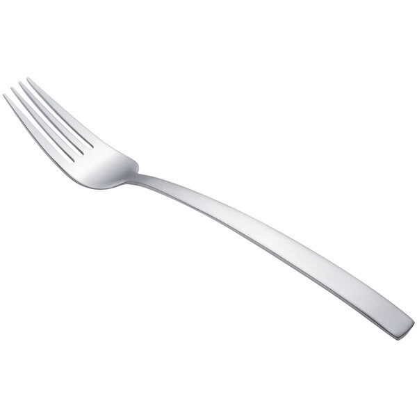 A close-up of a silver Arcoroc Satineo dessert fork with a white handle.
