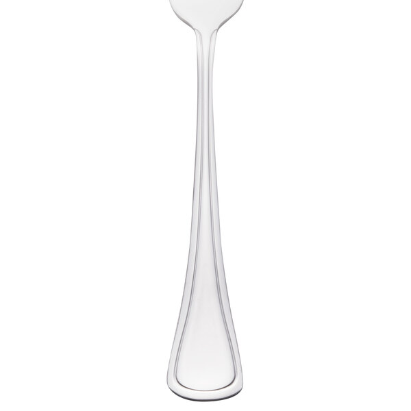 A close-up of a Libbey stainless steel dinner fork.