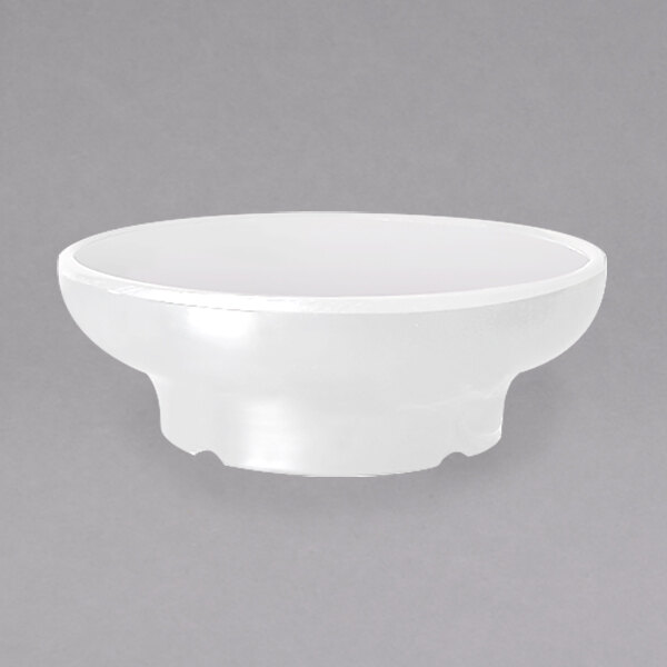 A white melamine salsa dish with a round base.