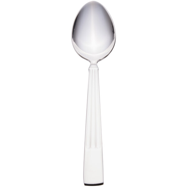 A Libbey stainless steel dessert spoon with a white handle and silver spoon end.