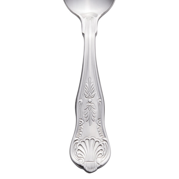 A close-up of a Libbey stainless steel demitasse spoon with a design.
