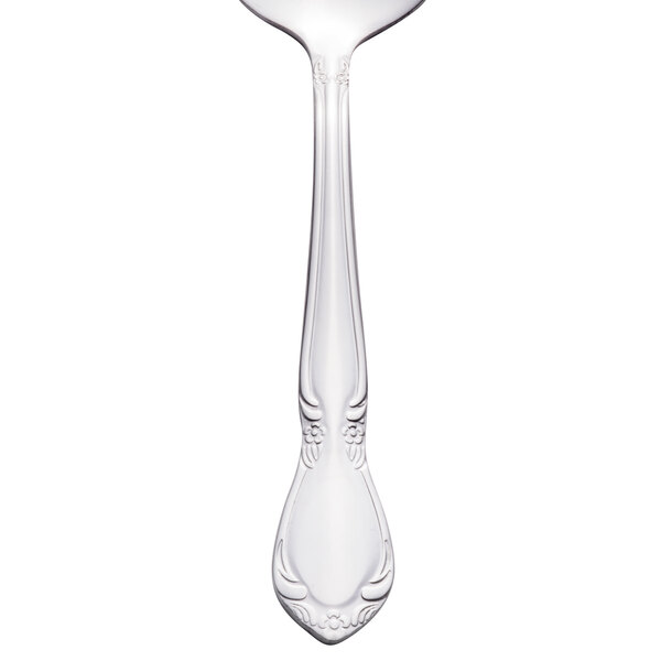 A Libbey stainless steel bouillon spoon with a silver handle.