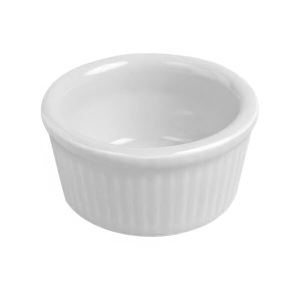 A white fluted Hall China ramekin with a white rim.