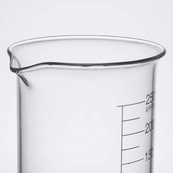 An American Metalcraft beaker glass with a measuring cup on top.