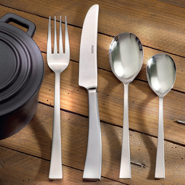 Arcoroc Latham stainless steel dinner forks on a table.
