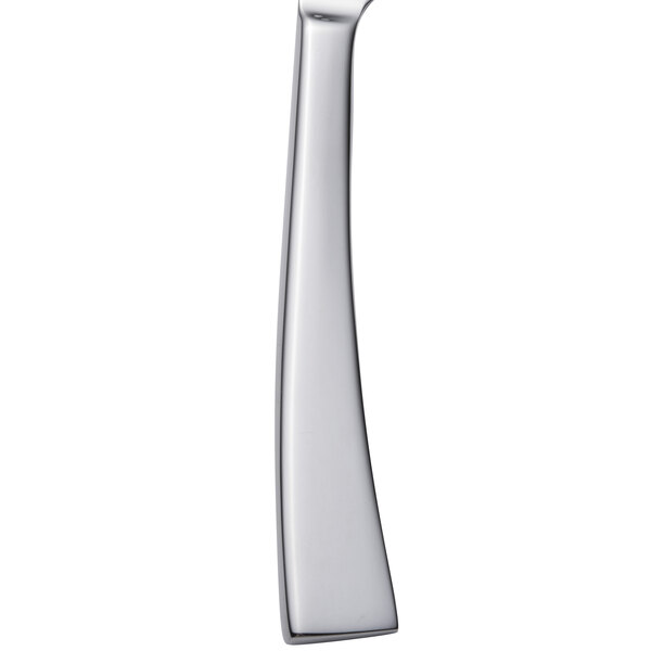 An Arcoroc stainless steel dessert knife with a white handle.