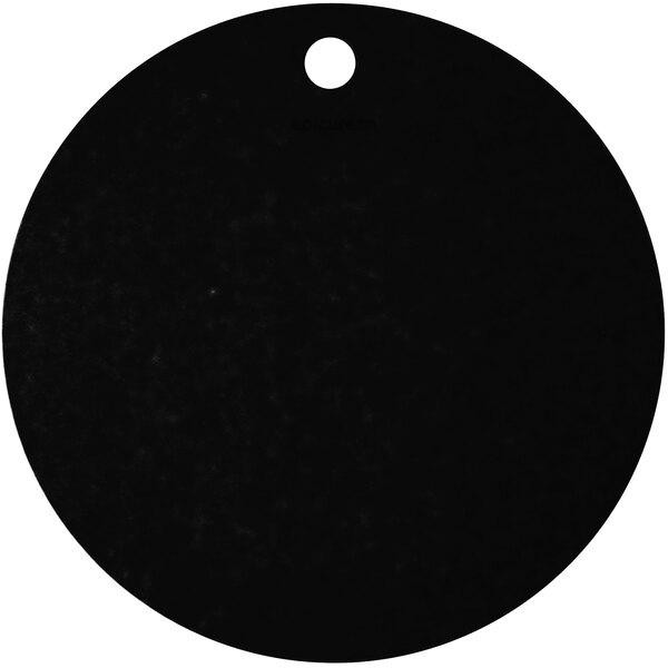 A black round Epicurean Richlite wood fiber pizza board with a hole in the center.