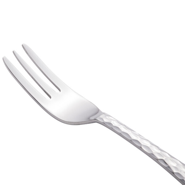 A Libbey stainless steel cocktail fork with a silver handle.