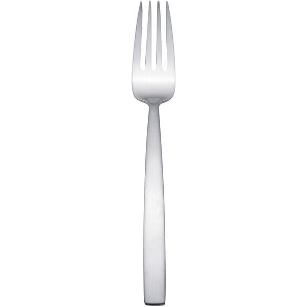 An Arcoroc stainless steel salad fork with a silver handle.