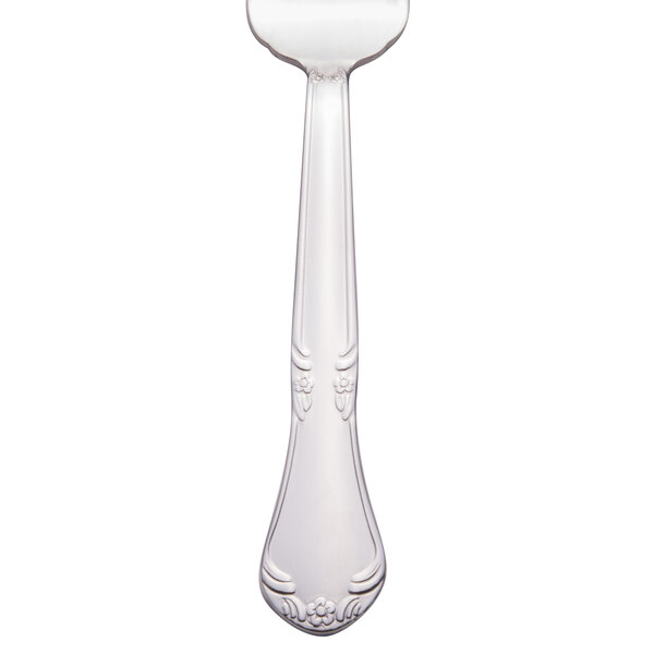 A Libbey stainless steel salad fork with a white handle.