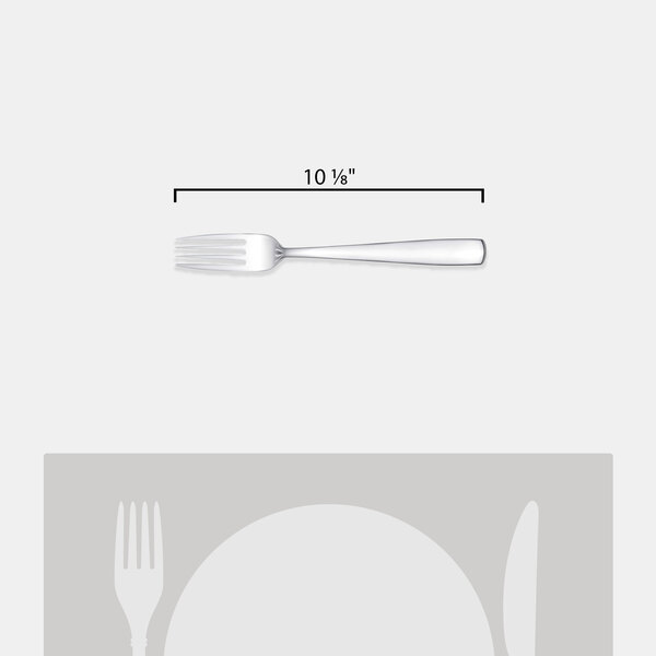An Arcoroc stainless steel serving fork on a table with a knife.