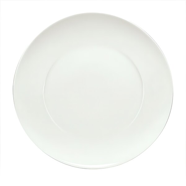 A Schonwald white porcelain plate with a round white border.