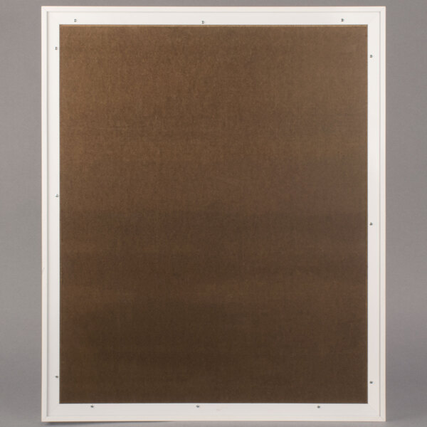 A white indoor bulletin board cabinet with a brown frame.