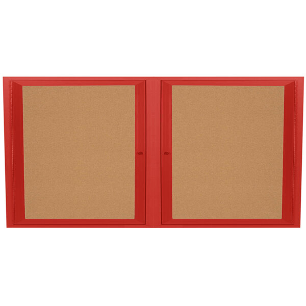 An Aarco red bulletin board cabinet with two doors and a red border.