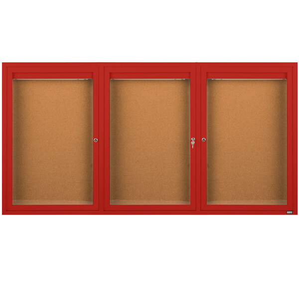 A red Aarco bulletin board cabinet with three glass doors.