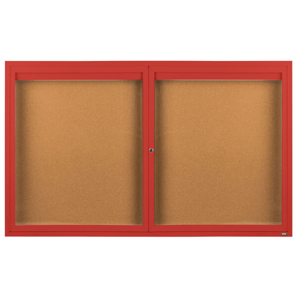 Two brown rectangular bulletin boards with red frames and doors.