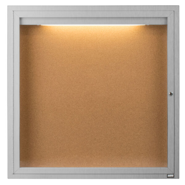 A white frame with a light on the back.
