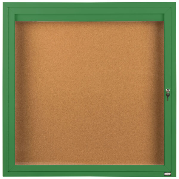 An Aarco green framed enclosed bulletin board.