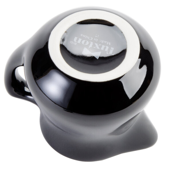 a black and white coffee cup