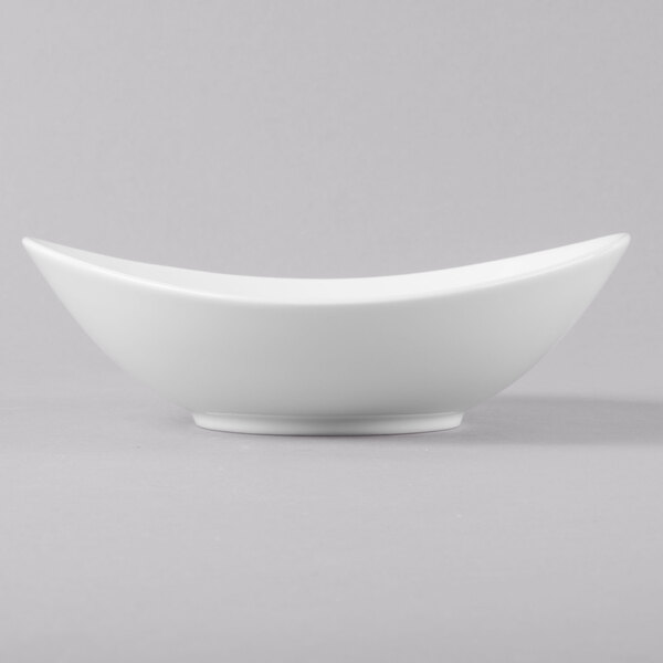 A close-up of a Schonwald white porcelain bowl with a small rim.