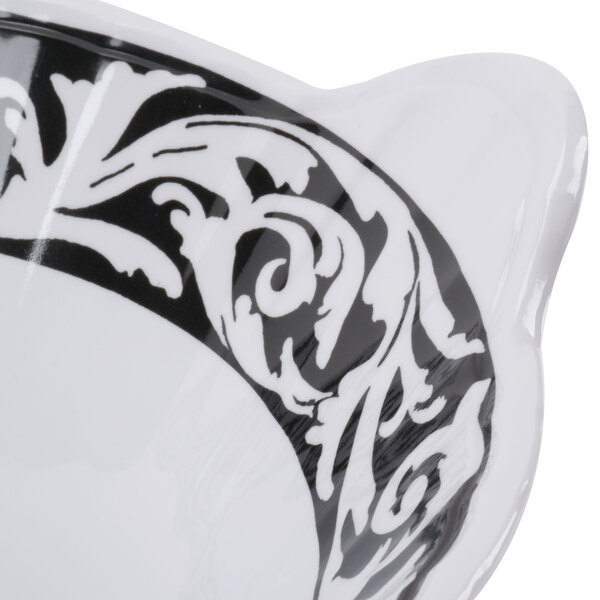A white GET Soho melamine bowl with a black design.