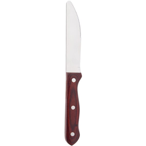 A Chef & Sommelier steak knife with a brown wooden handle.