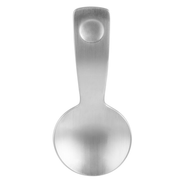 A close-up of a Schonwald silver tapas spoon with a handle.